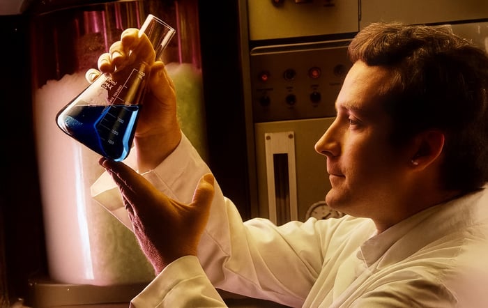 Bill Sparks holding beaker